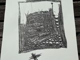 a picture of a drawing on a piece of paper on a table