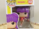 a close up of a pop vinyl figure in a box
