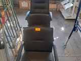 a lot of chairs that are sitting in a room
