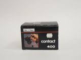 a box of contact film sitting on top of a white surface