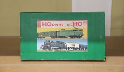 a green box with a picture of a train on it