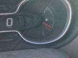 a close up of a car dashboard with a speedometer