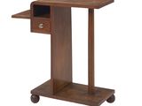 une petite table en bois surmontée d'un tiroir