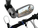 a picture of a rear view mirror and a bicycle handlebar
