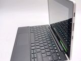 a laptop that is open and sitting on a table