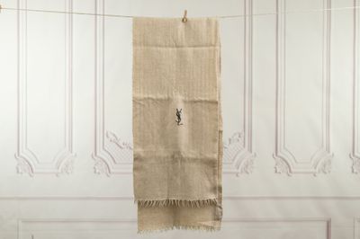 a towel hanging on a clothes line in a room