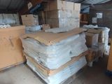 a pile of boxes and boxes in a warehouse