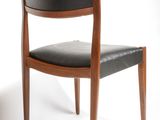 two chairs that are sitting next to each other