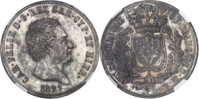 a close up of a coin with a crown on it