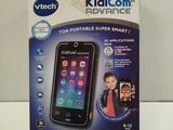packaging of a kidicam cell phone sitting on a white surface