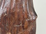 a wooden vase that is sitting on a table