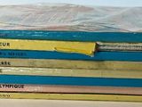books stacked on top of each other on a table