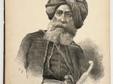 an old black and white photo of a man with a turban