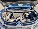 the engine of a car with its hood open and the hood open