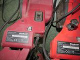 two electric tools that are sitting on the floor