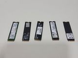 a close up of four different types of ram cards on a table