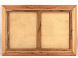 an old picture frame with a wooden frame and a white background