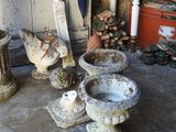 many pieces of art that are sitting on the floor