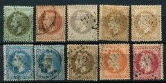 a group of stamps with different faces on them