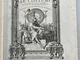 un vieux livre sur lequel figure l'image d'un homme assis sur un trône