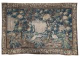 an image of a tapestry hanging on a wall with birds and trees