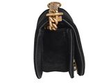 a black purse with a gold chain hanging from it