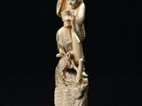 chinese carved ivory figurine of a woman holding a child