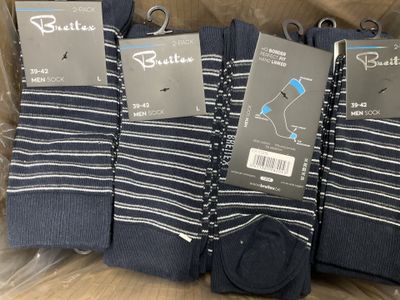 six pairs of men ' s blue and white striped socks in a box