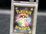 the pokemon card is in a clear plastic holder on a table