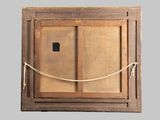 an old picture of a wooden frame with a rope around it