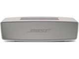 a close up of a speaker on a white surface