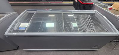 a glass display case in the middle of a store
