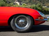 an image of a red sports car parked in a parking lot