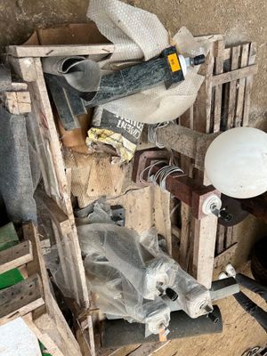 a pile of assorted items sitting on the floor