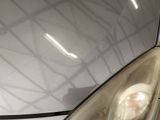 a close up of a car ' s headlight on a car