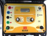 an image of a close up of a yellow and black machine