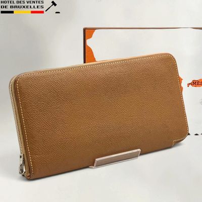 wallet with card holder and card holder in front of it