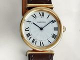 an image of a close up of a wrist watch with roman numerals