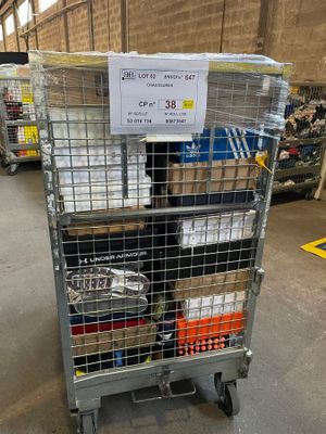a cart with a lot of items on it in a warehouse