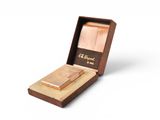 a wooden box with a lighter in it on a white surface
