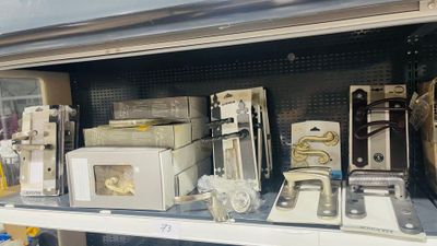 many different types of electronics on the shelves