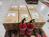 several boxes of fire extinguisors sit on a pallet in a warehouse