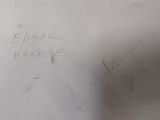 a white board with writing on it in a room