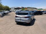 a lot of cars parked in a parking lot