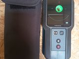 a close up of a black case with a black object in it