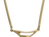 un gros plan d'un collier en or orné d'un diamant