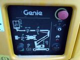 a close up of a control panel on a yellow machine