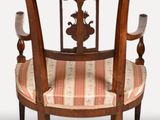 two chairs that are sitting next to each other