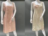 three mannequins in different colors of dresses on a mannequin