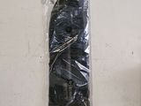 a plastic bag with a black object inside of it